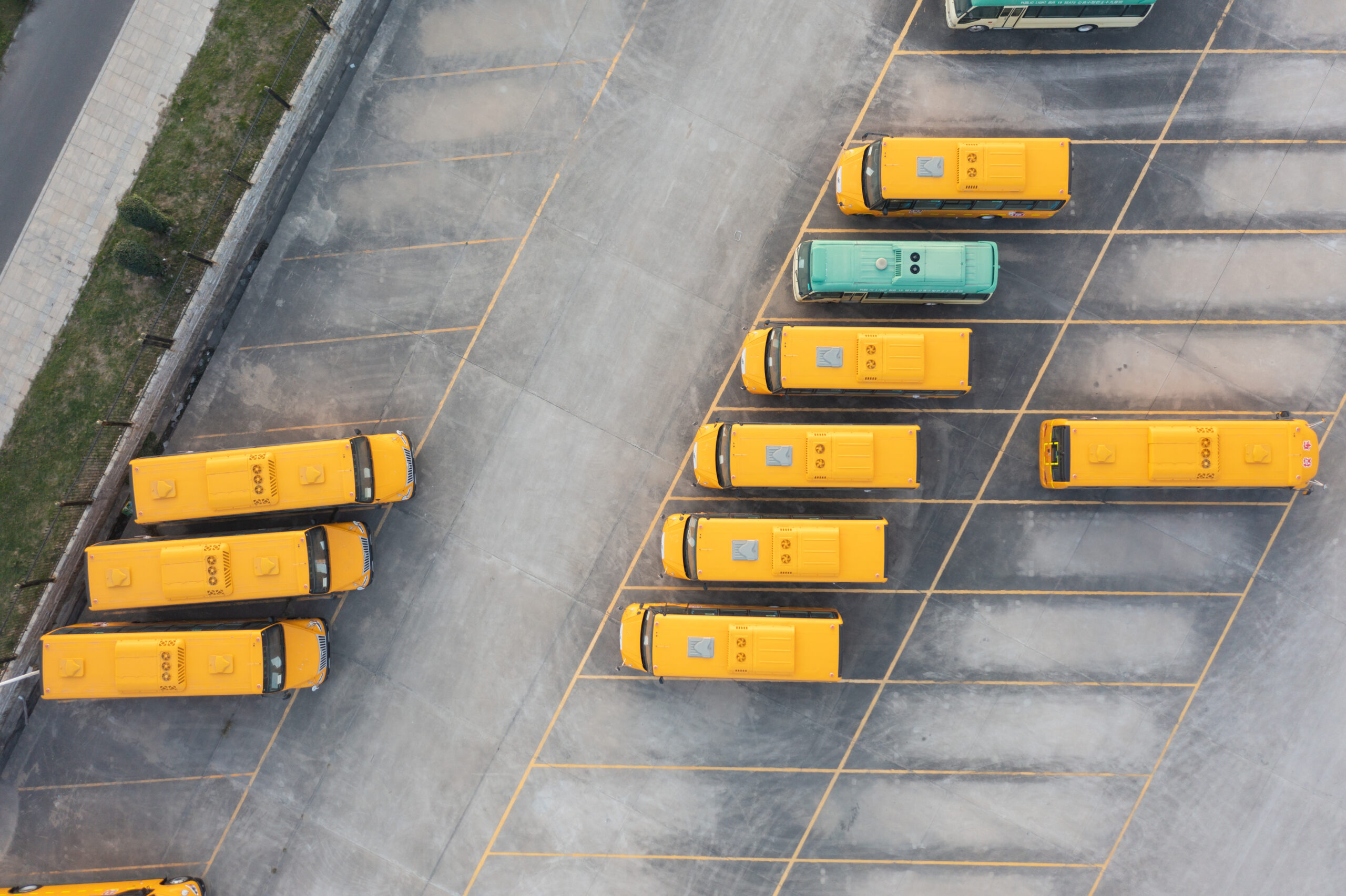 Aerial view of electric bus at factory parking lot