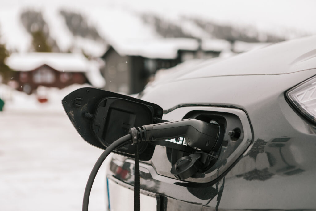 Close-up of a charging cable in an electric car.